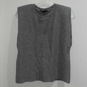 Shoulder pad sweater tee